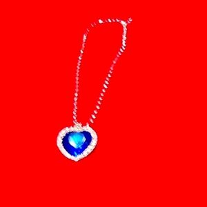 Diamond necklace with blue heart pendant